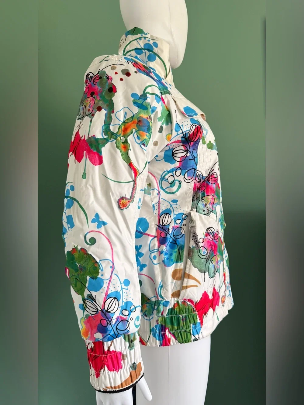 Spyder Women's White Ski Jacket with Multicolor Abstract Art Print